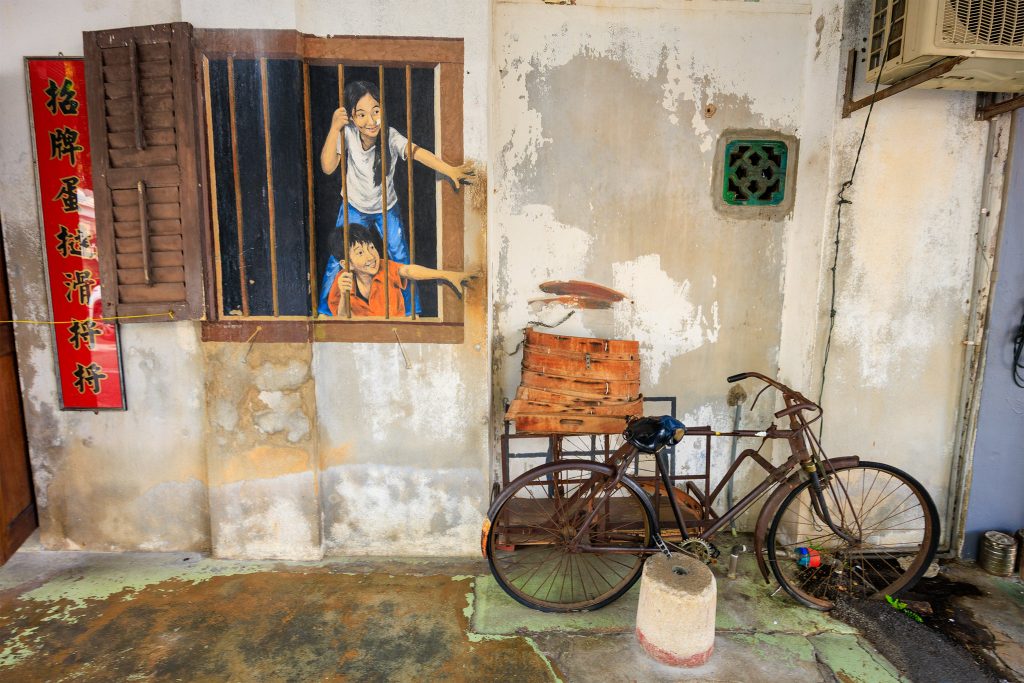 George Town street mural of a girl